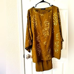 A two piece set partywear dress light weight brand new shirt is fully sequined